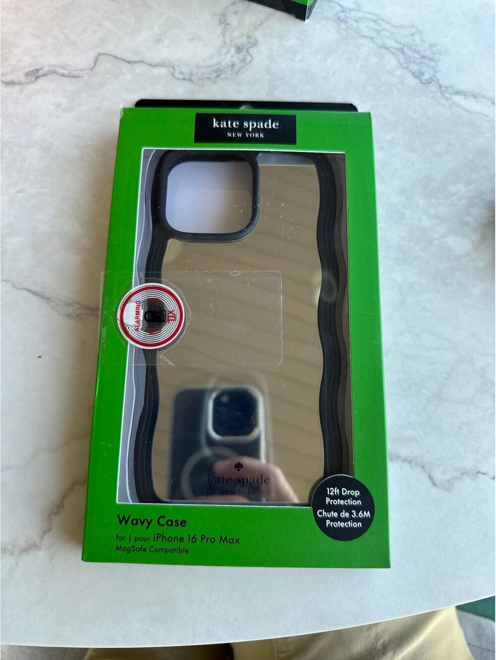 Kate Spade wavy case for iPhone 16 Pro Max. Mirror finish.